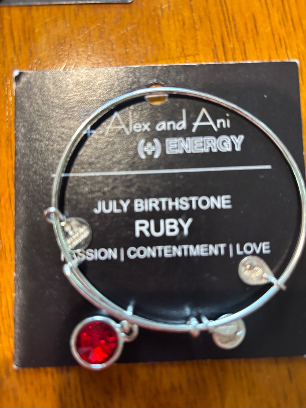 Alex and Ani Silver Bangle with Ruby Red Charm